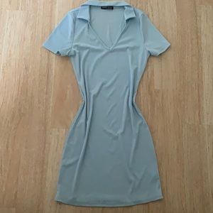 Light blue skin tight dress.